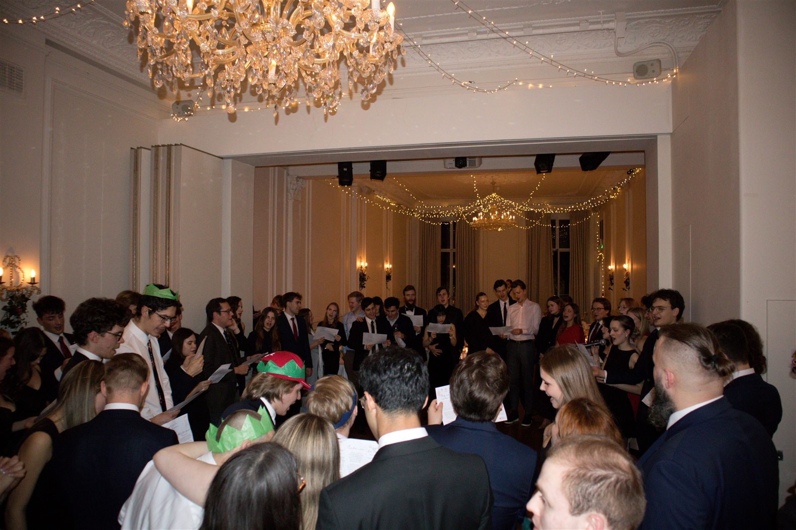 Guests singing Christmas carols together